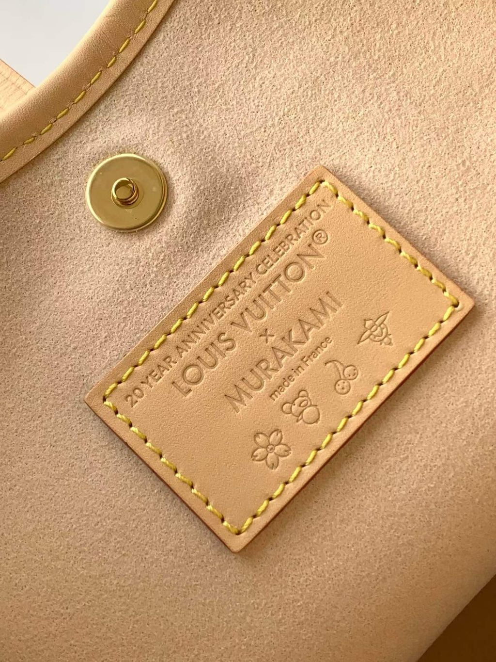 （M13661）The CarryAll Mini handbag is from Louis Vuitton.