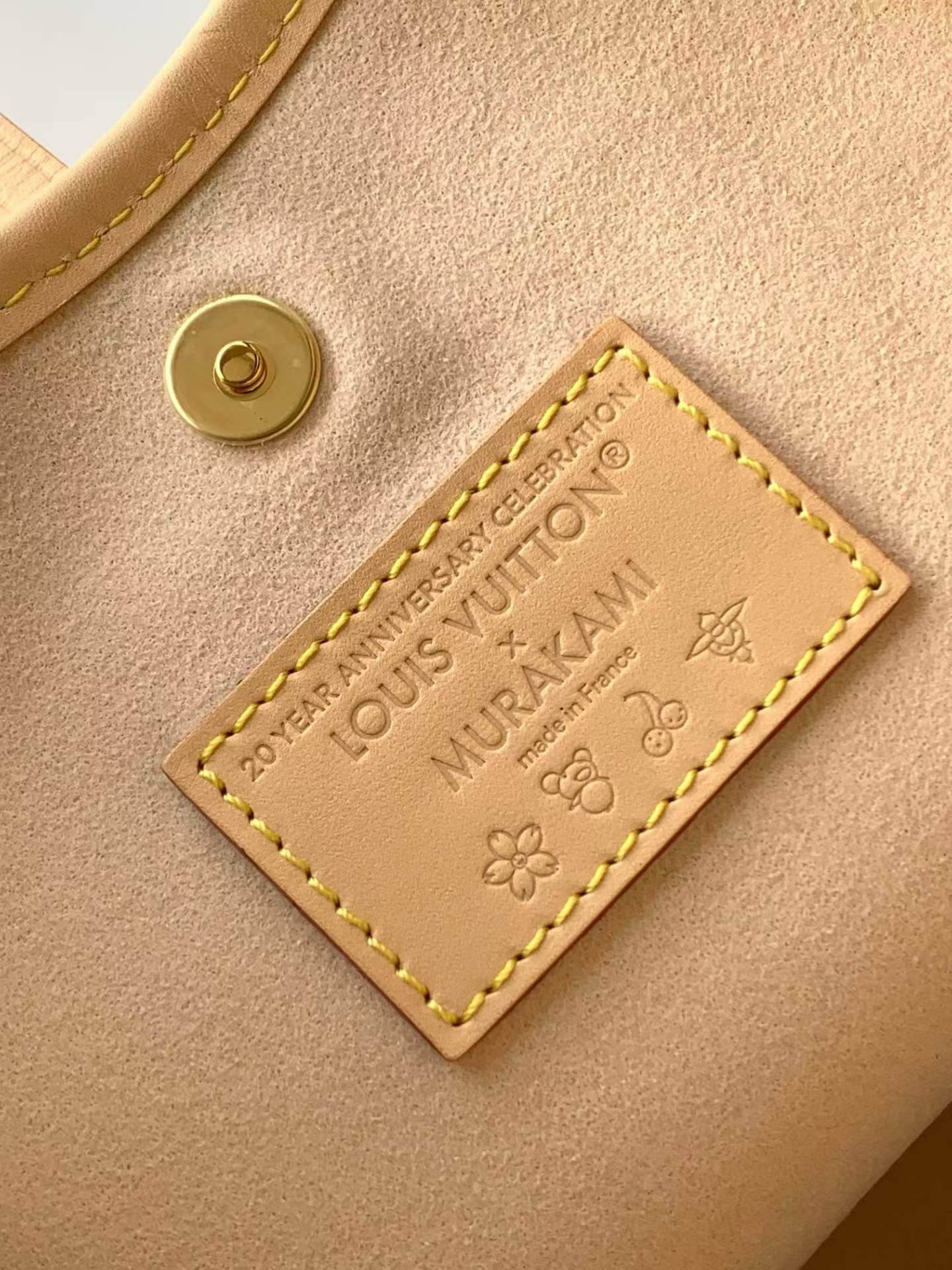 （M13661）The CarryAll Mini handbag is from Louis Vuitton.