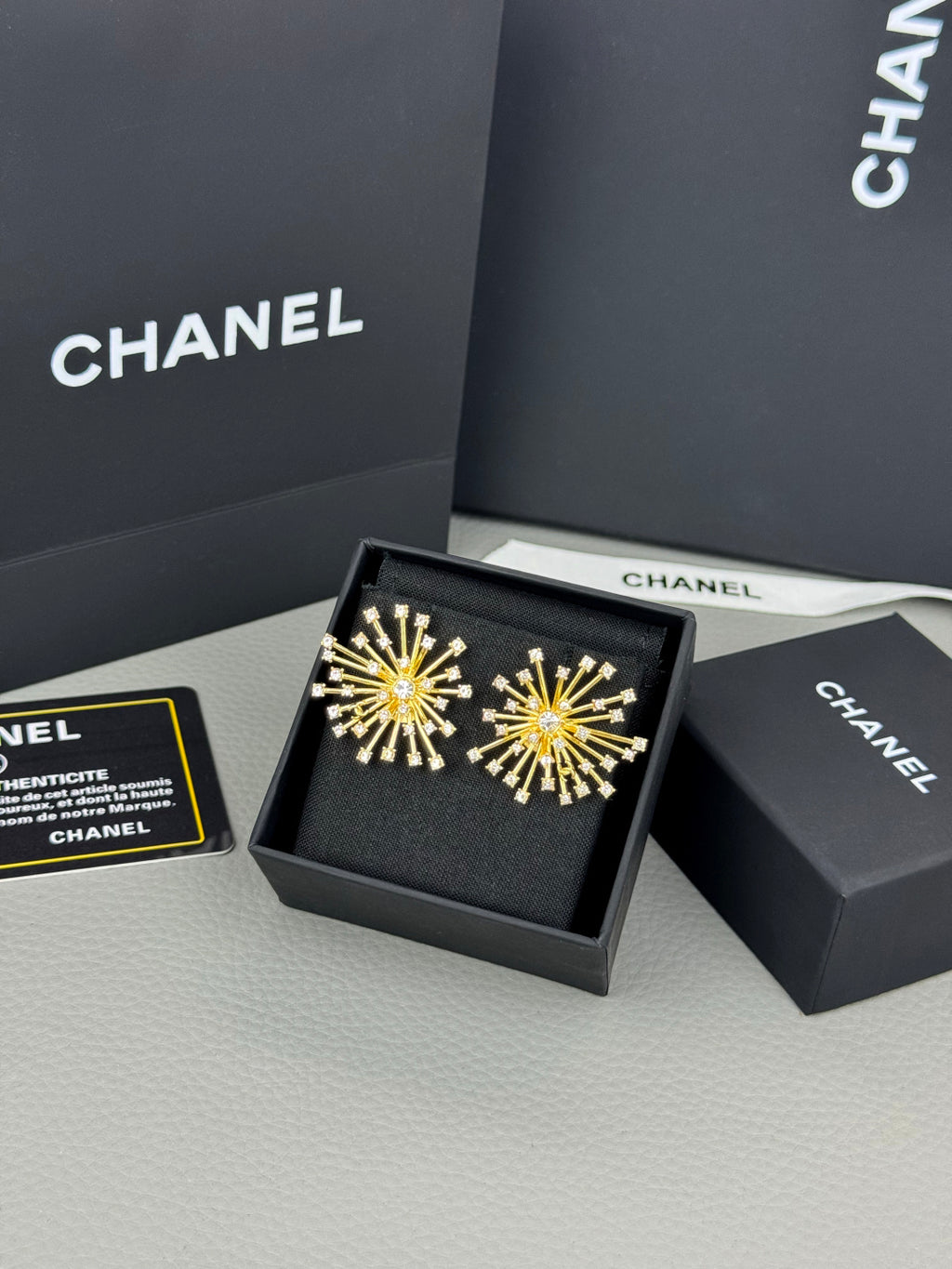 Full-crystal stud earrings.