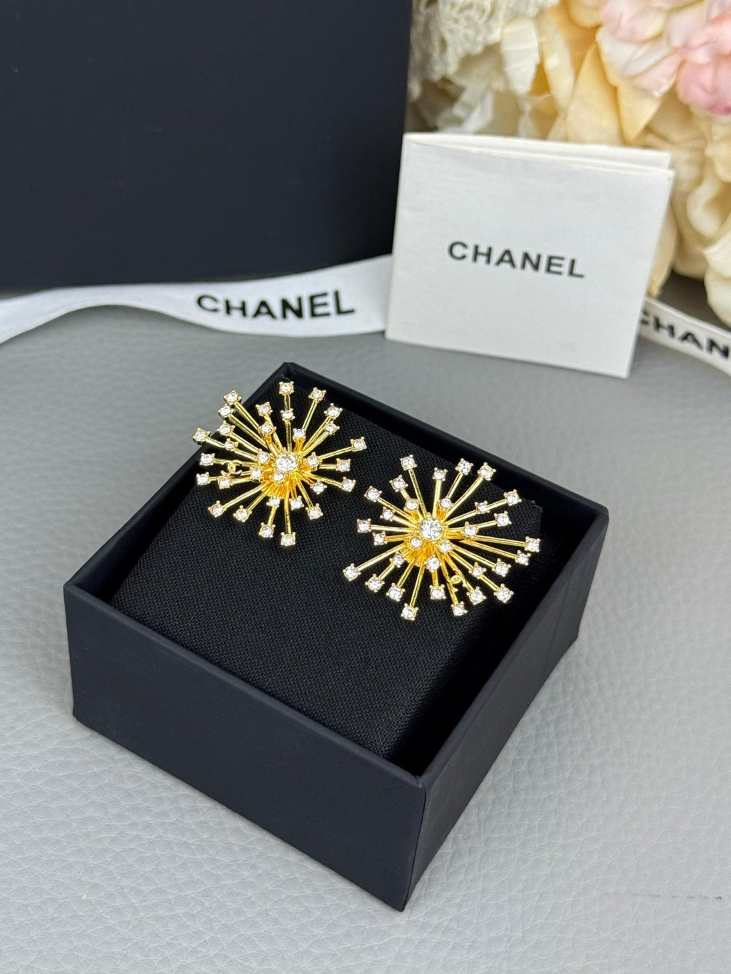 Full-crystal stud earrings.