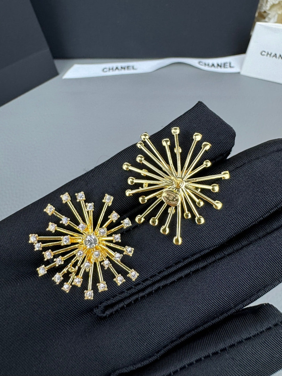 Full-crystal stud earrings.