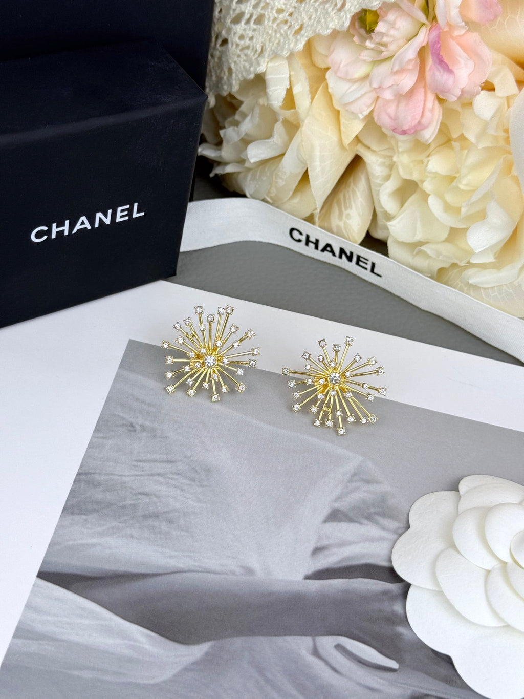 Full-crystal stud earrings.