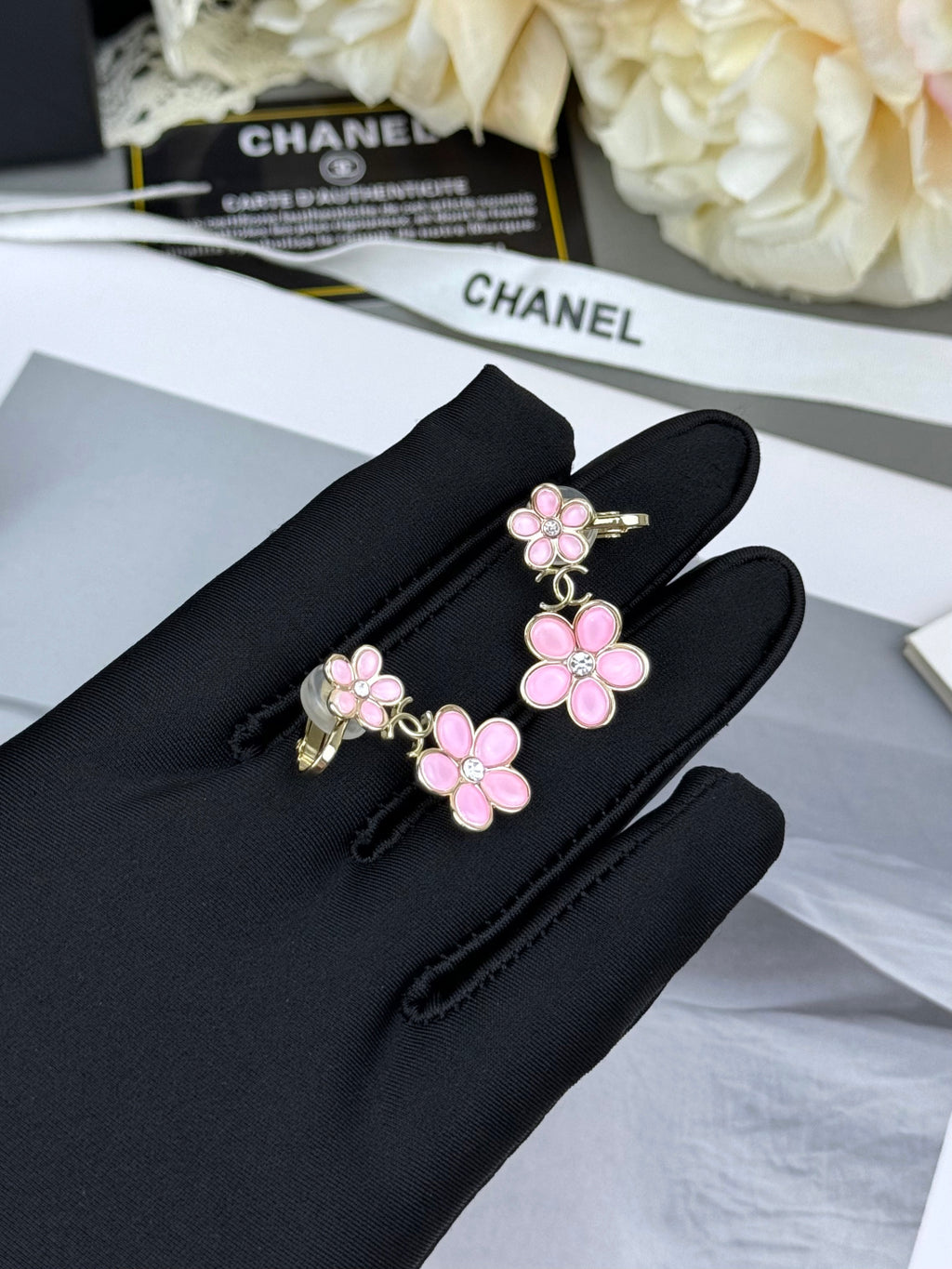 Floral ear studs.