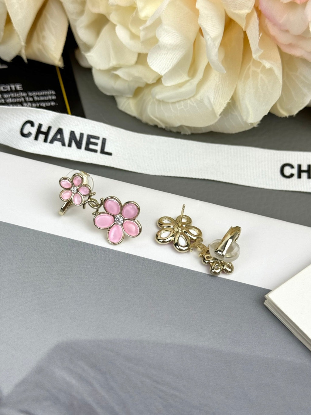 Floral ear studs.
