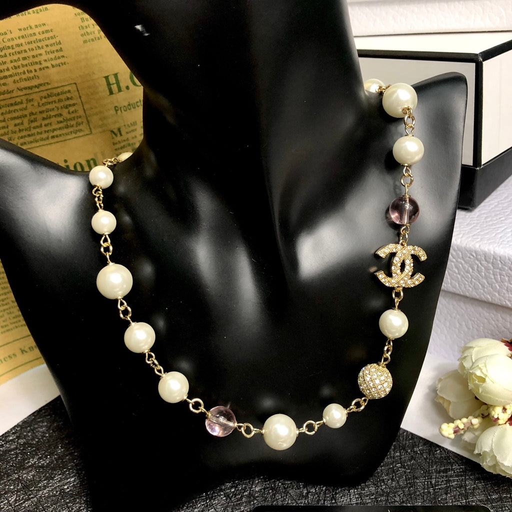 Pearl neck chain necklace.