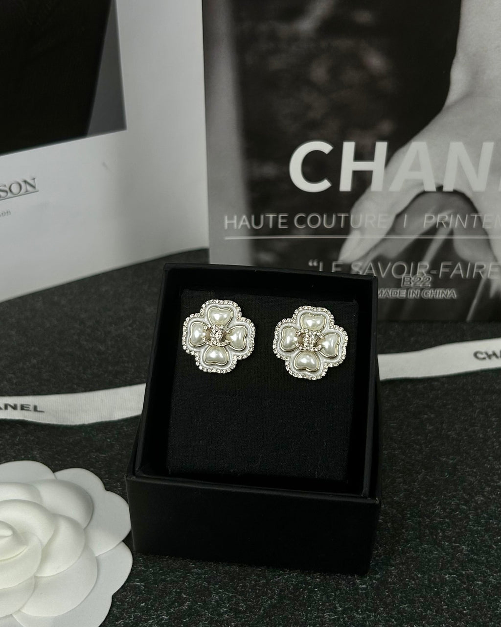 Diamond-encrusted ear studs.