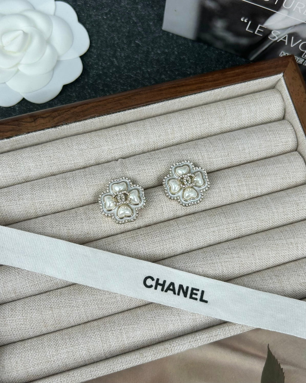 Diamond-encrusted ear studs.