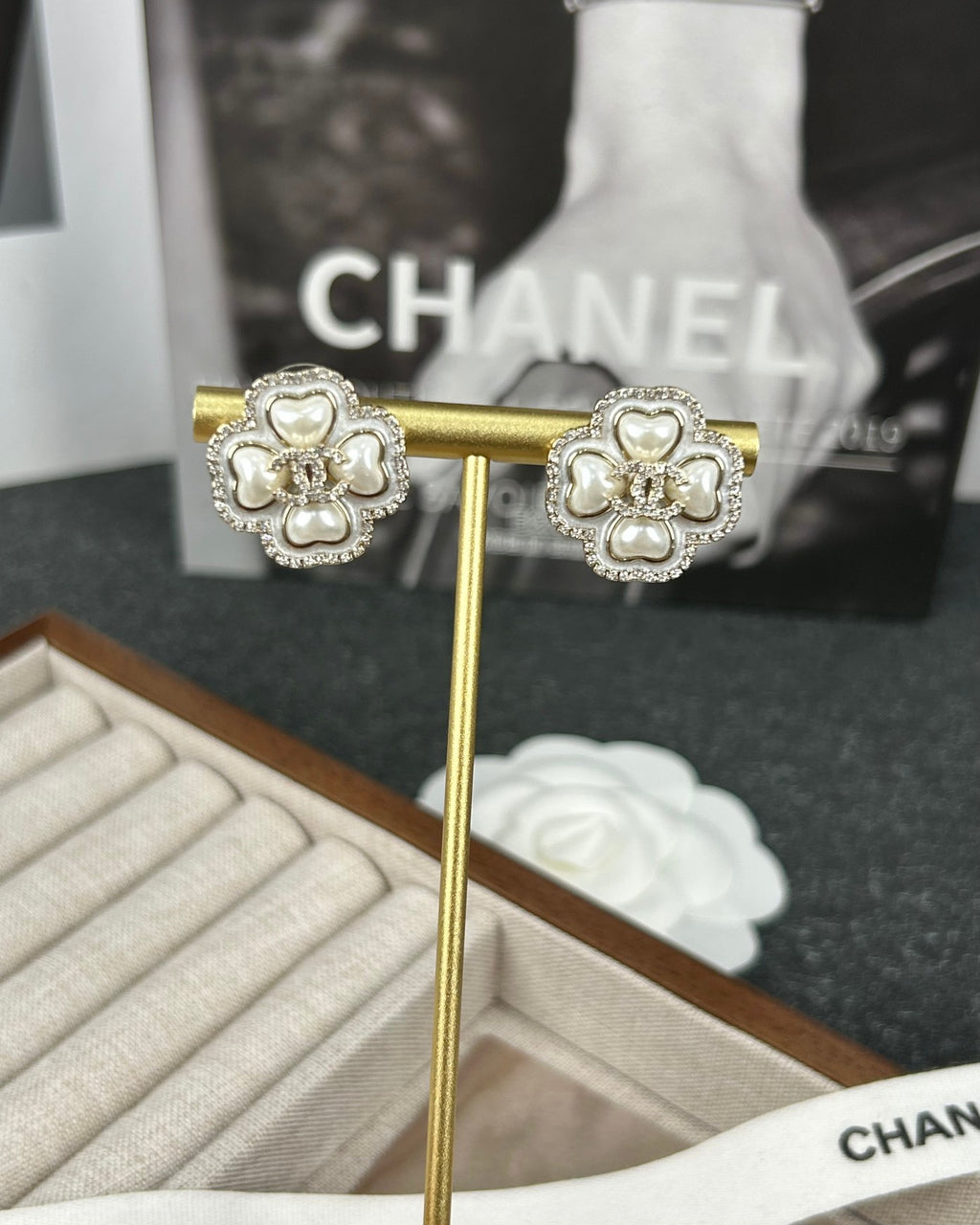 Diamond-encrusted ear studs.