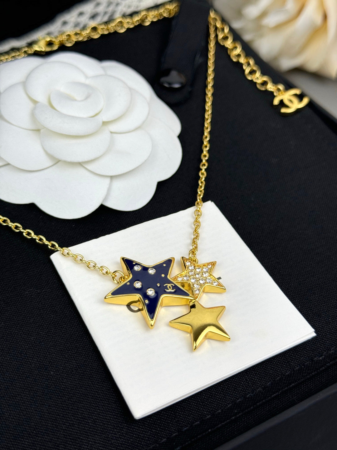 Star necklace.