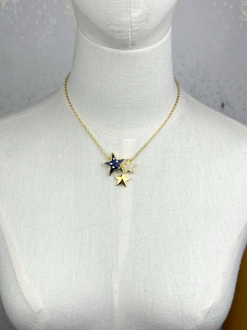 Star necklace.