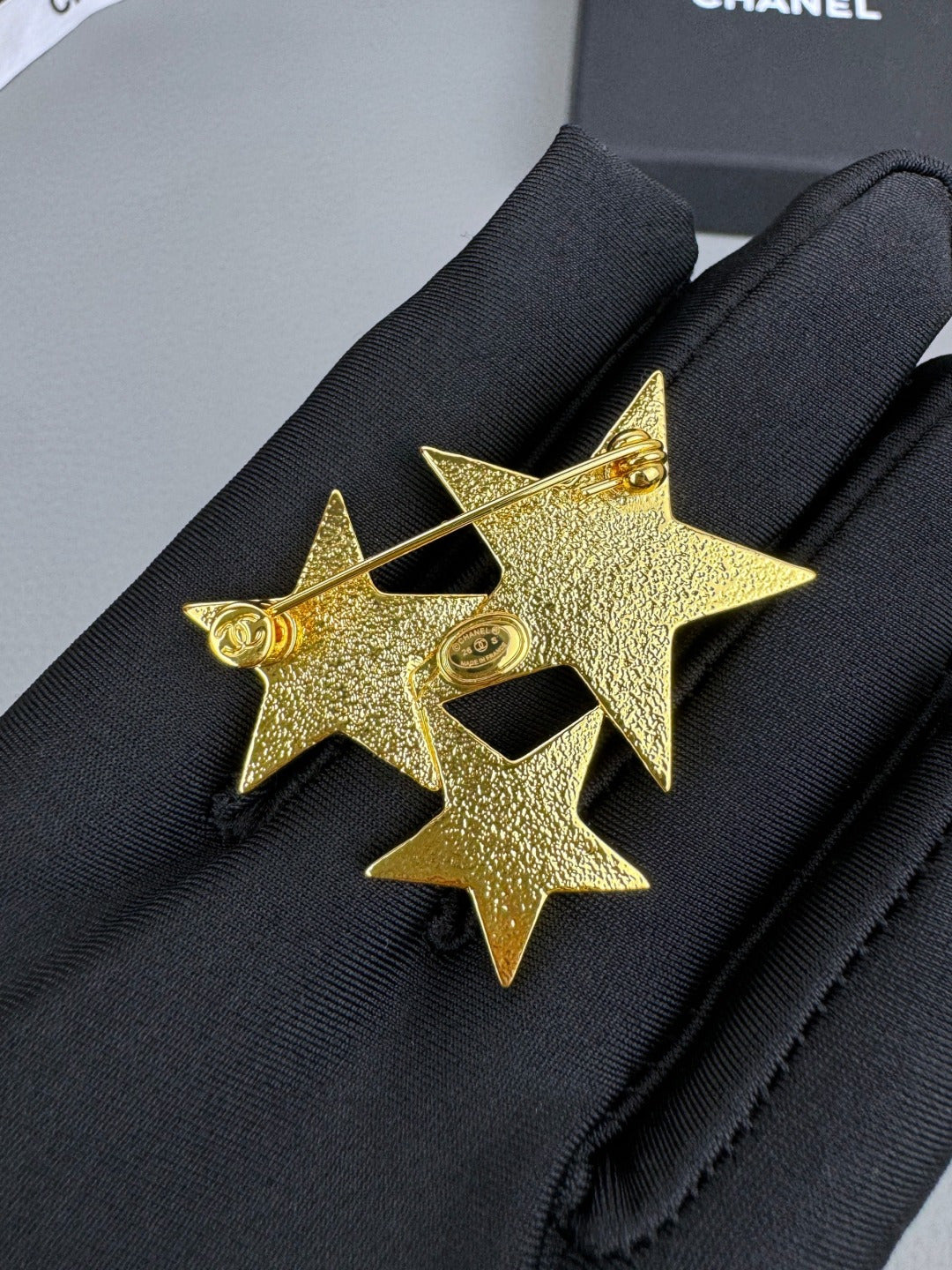 Star brooch.