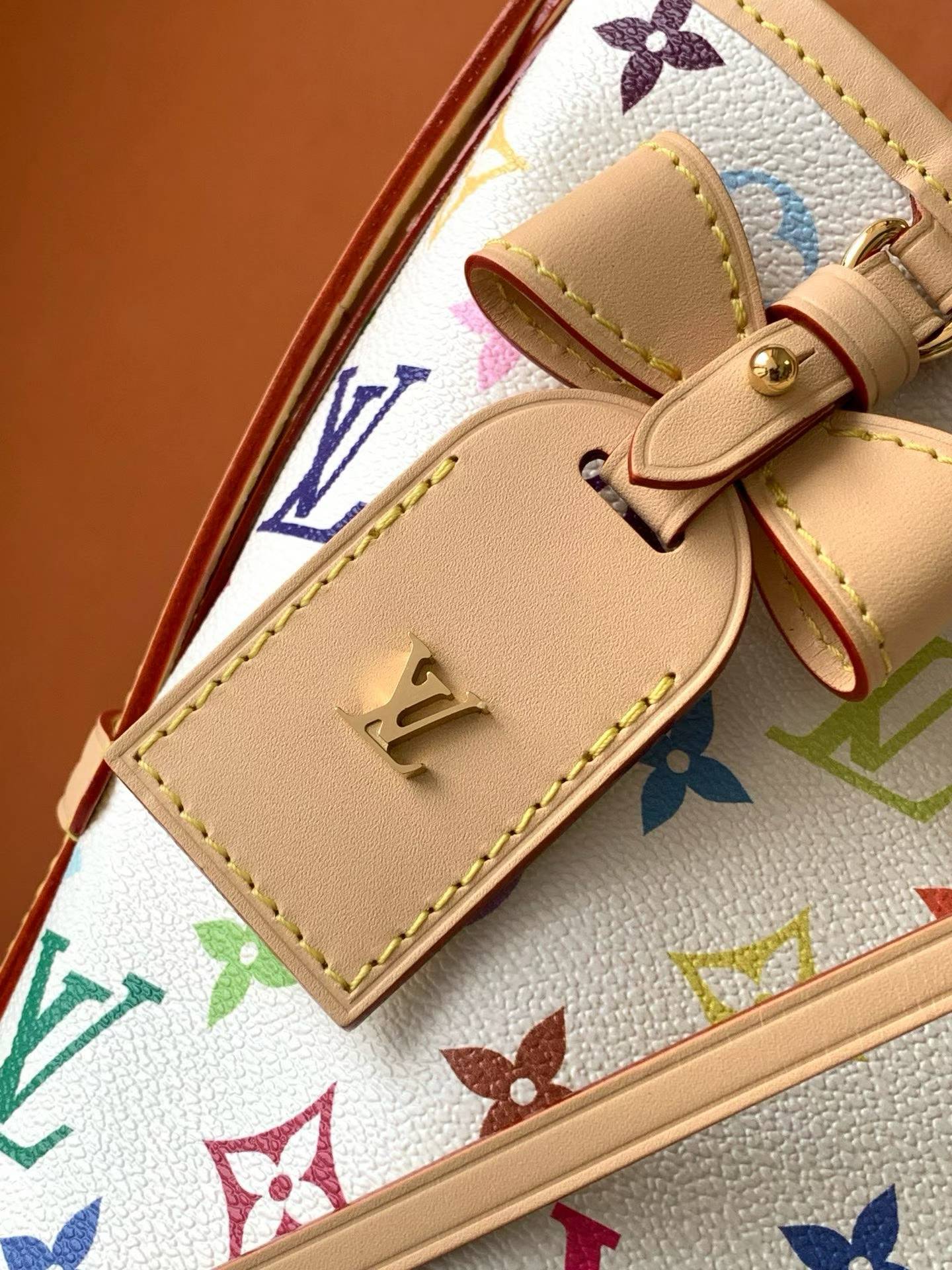 （M13661）The CarryAll Mini handbag is from Louis Vuitton.