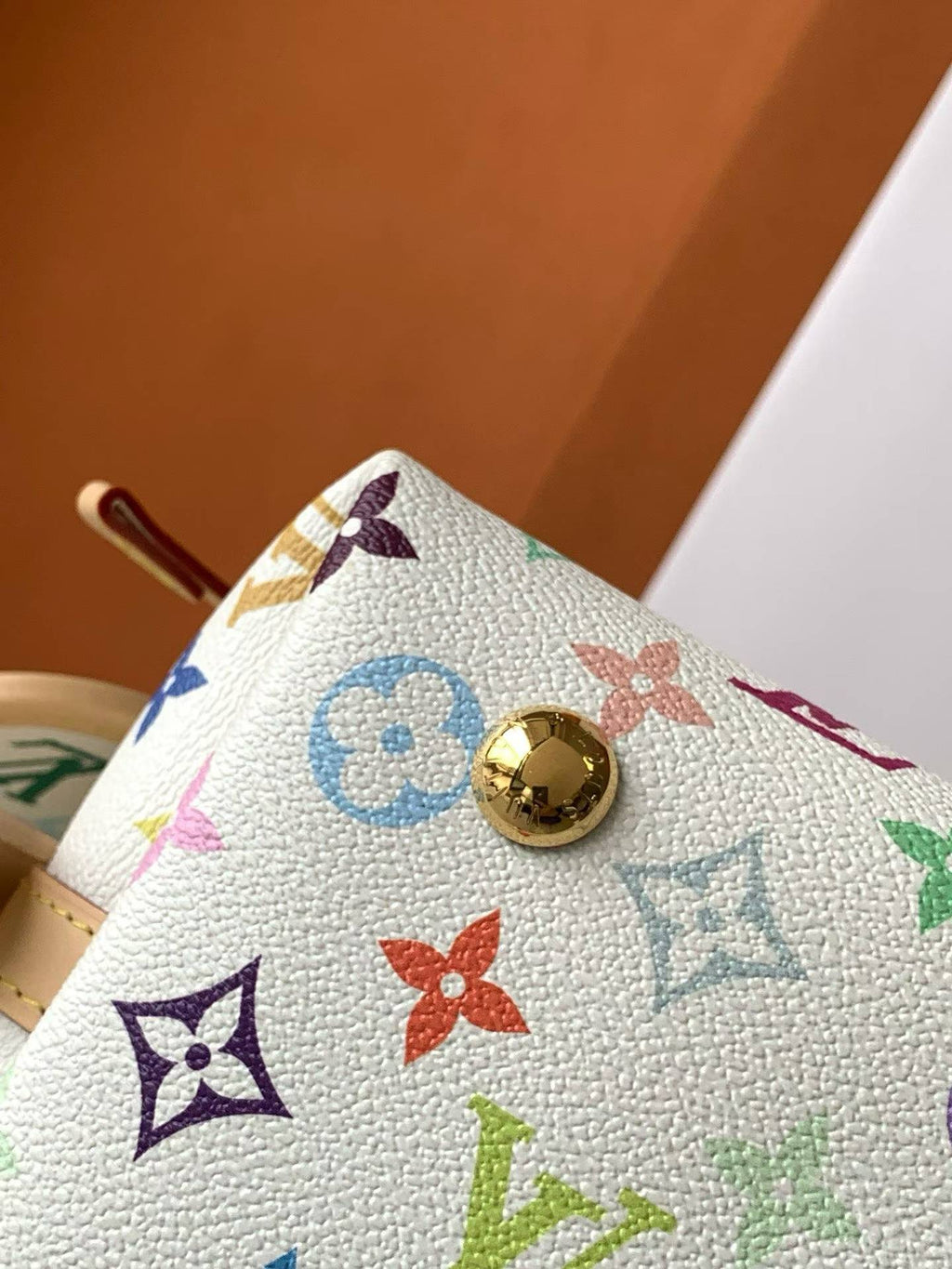 （M13661）The CarryAll Mini handbag is from Louis Vuitton.