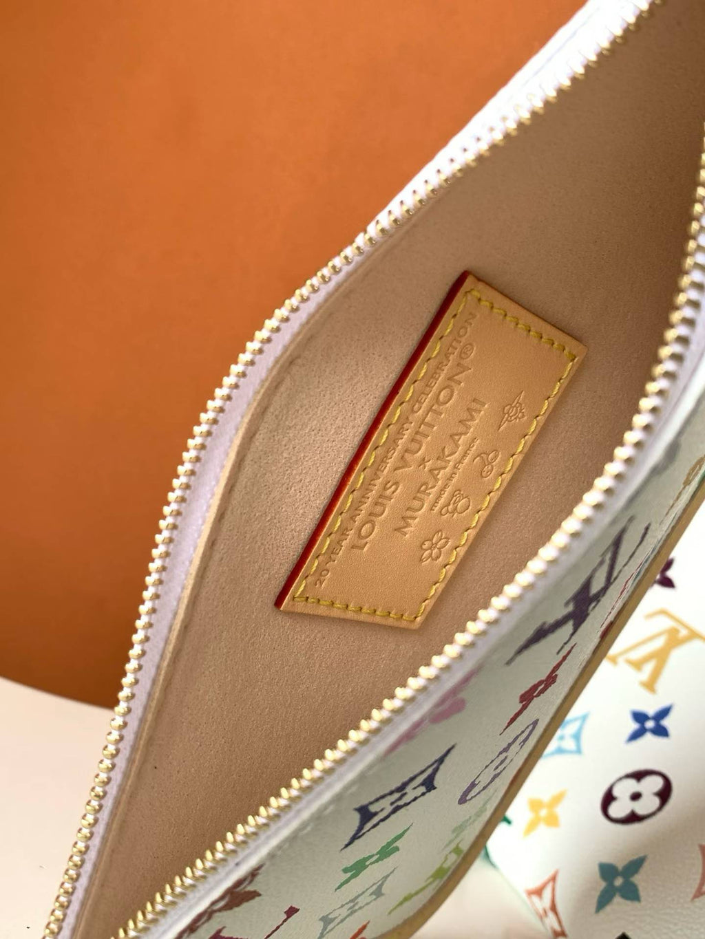 （M13661）The CarryAll Mini handbag is from Louis Vuitton.